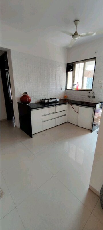Kitchen in 2 BHK Apartment at Shubh Skypoint, Mundhwa – for Rent