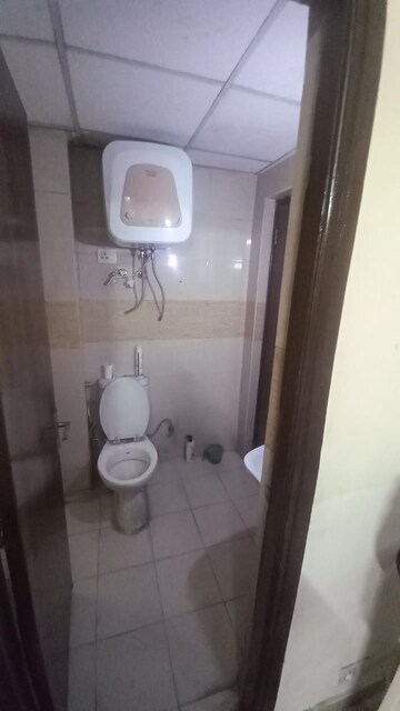 Bathroom in 1.5 BHK Builder Floor at Tulip Mall, Sector 46 – for Rent