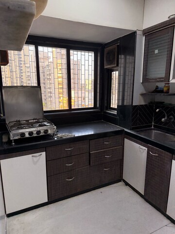 Kitchen in 2 BHK Apartment at Vijay Annex 31, Waghbil – for Rent