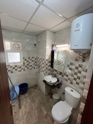 Bathroom in 2 BHK Apartment at Apex Athena, Sector 75 – for Sale