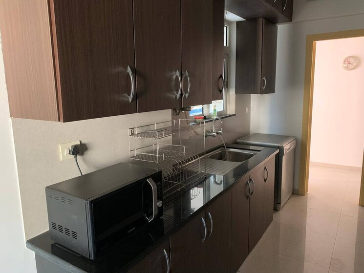 Kitchen, amrapali-princely-estate 2.5 Bedroom 1200 Sq.Ft. Apartment In Sector 76 Noida 8579749