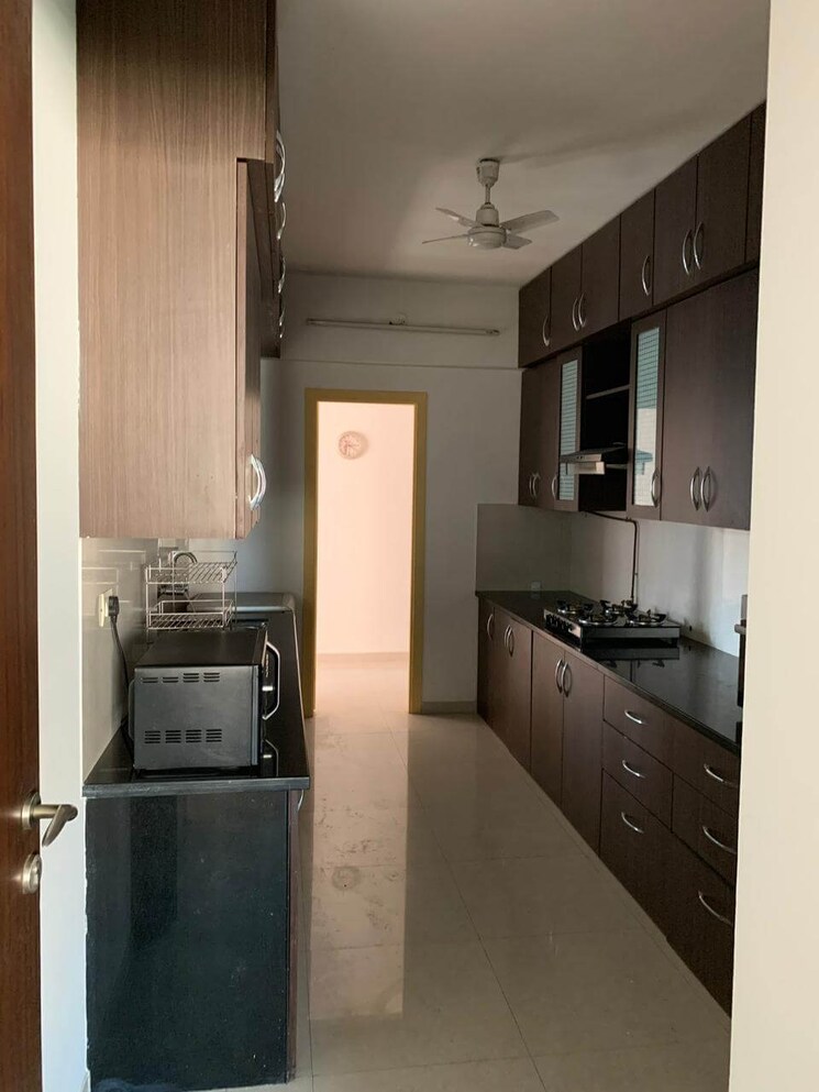 Kitchen, amrapali-princely-estate 2.5 Bedroom 1200 Sq.Ft. Apartment In Sector 76 Noida 8579749
