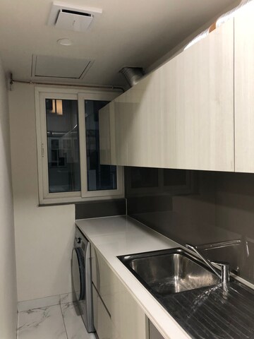 Kitchen in 2.5 BHK Builder Floor at Central Park Cerise Suites, Sohna Sector 33 – for Rent