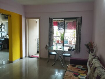 Living Room in 1 BHK Apartment at Gulmohar CHS Shivane, Shivane – for Sale