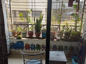 Balcony in 1 BHK Apartment at Gulmohar CHS Shivane, Shivane – for Sale