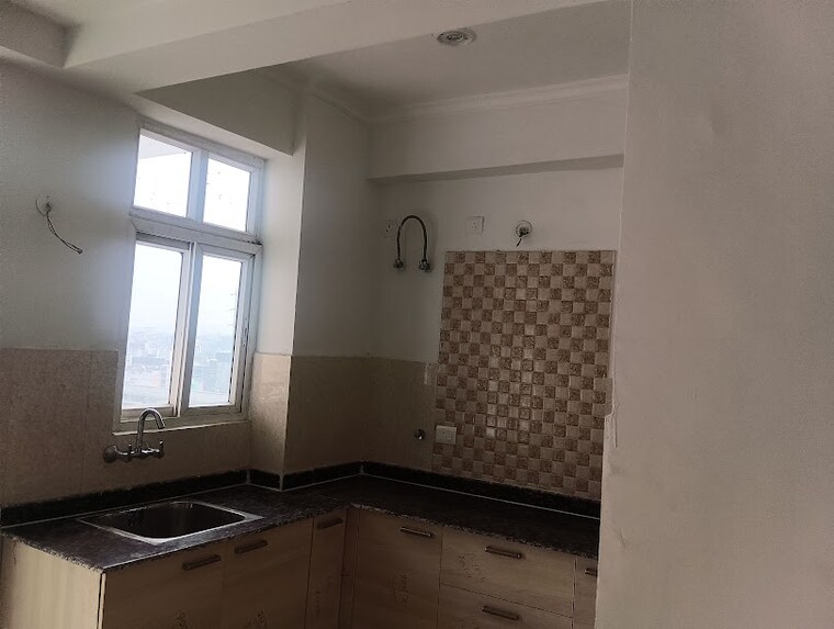 Kitchen, amrapali-princely-estate 4 Bedroom 5215 Sq.Ft. Penthouse In Sector 76 Noida 8583604