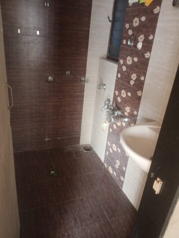Bathroom in 1 BHK Apartment at Salasar Aangan, Mira Road – for Rent