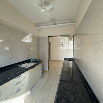 Kitchen in 1 BHK Apartment at Je And Vee Om Trimurti, Dindoshi – for Rent