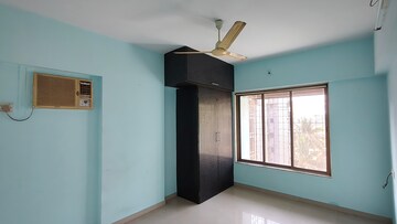 Bedroom in 1 BHK Apartment at Acme Apna Ghar, Goregaon East – for Rent