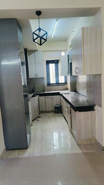 Kitchen in 2.5 BHK Apartment at RPS Savana, Sector 88 – for Rent
