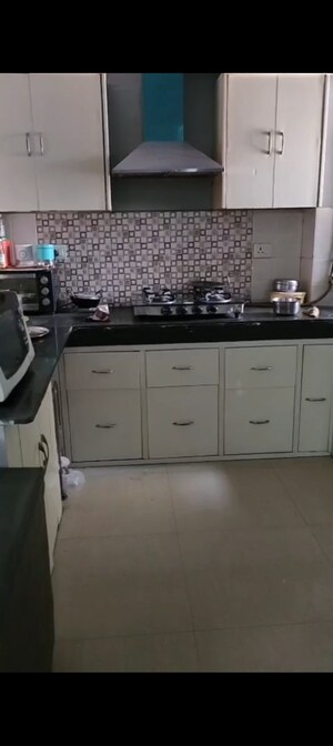 Kitchen in 3 BHK Apartment at High End Paradise II, Raj Nagar Extension – for Sale