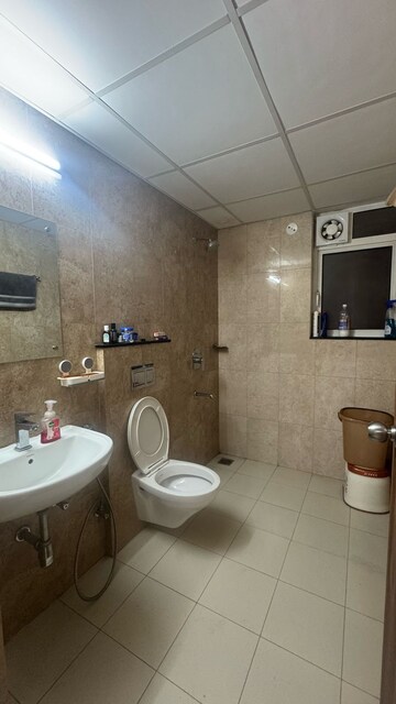 Bathroom in 3.5 BHK Apartment at Raheja Vedaanta, Sector 108 – for Rent