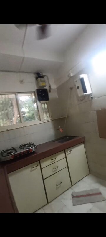 Kitchen in 3 BHK Apartment at Dignity Apartments, Andheri West – for Rent