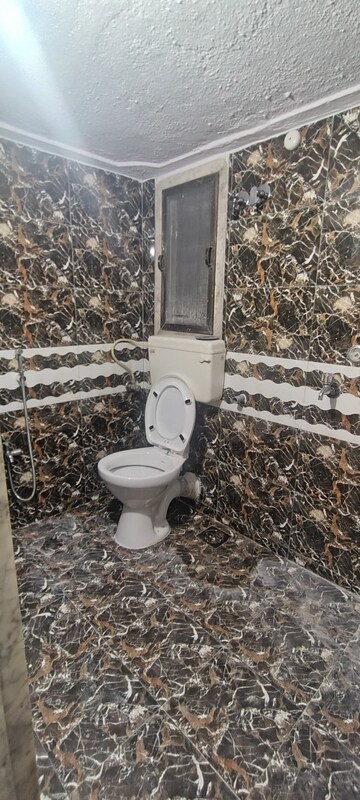 Bathroom in 1 BHK Apartment at NG Palms, Mira Road – for Rent