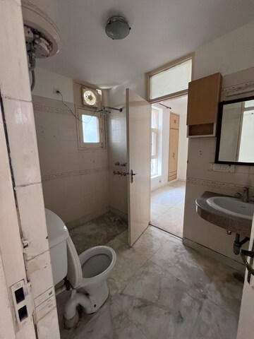 Bathroom in 4 BHK Apartment at Tarika CGHS, Sector 43 – for Rent