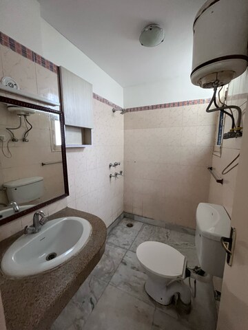 Bathroom in 4 BHK Apartment at Tarika CGHS, Sector 43 – for Rent