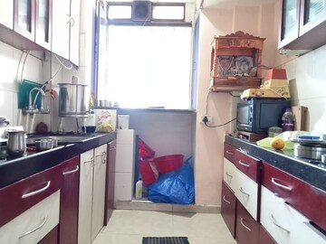 Kitchen in 2 BHK Apartment at Lodha Paradise, Majiwada – for Sale