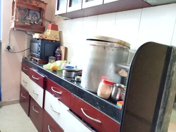 Kitchen in 2 BHK Apartment at Lodha Paradise, Majiwada – for Sale