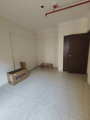 Living Room in 1 BHK Apartment at Raunak City, Kalyan West – for Sale