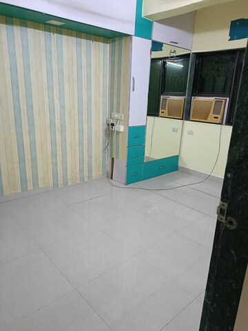 Bedroom in 3 BHK Apartment at Adarsh CHS Kopar Khairane, Kopar Khairane – for Rent
