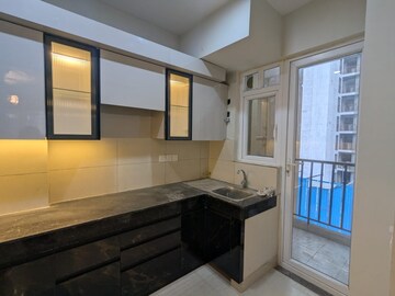 Kitchen in 3 BHK Apartment at Tata Eureka Park, Sector 150 – for Rent