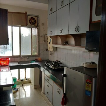 Kitchen in 2 BHK Apartment at DLF Silver Oaks, Sector 26 – for Sale