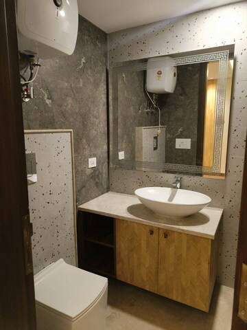 Bathroom in 3 BHK Builder Floor at Panchsheel Enclave – for Sale