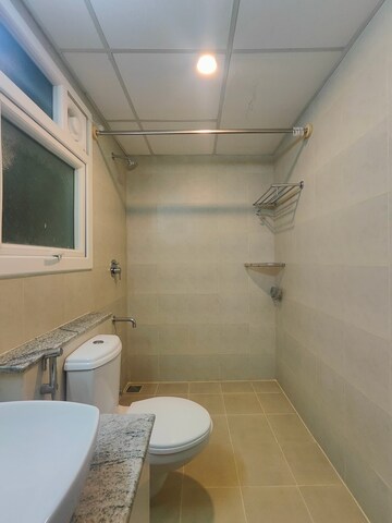 Bathroom in 3 BHK Apartment at Bhartiya Nikoo Homes, Thanisandra Main Road – for Rent