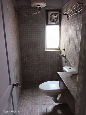 Bathroom in 2 BHK Apartment at Paras Tierea, Sector 137 – for Sale