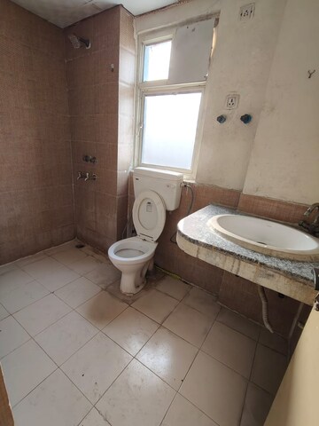 Bathroom in 3 BHK Apartment at Nimbus Express Park View, Chi V Greater Noida – for Sale