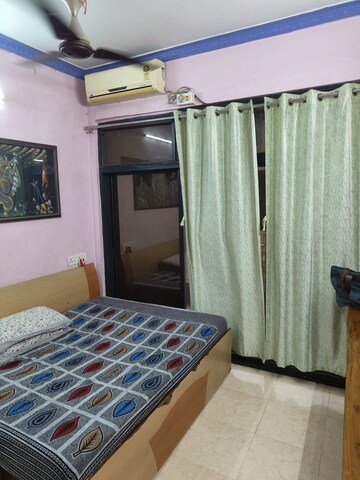 Bedroom in 2 BHK Apartment at Siddhi CHS, Kharghar – for Rent