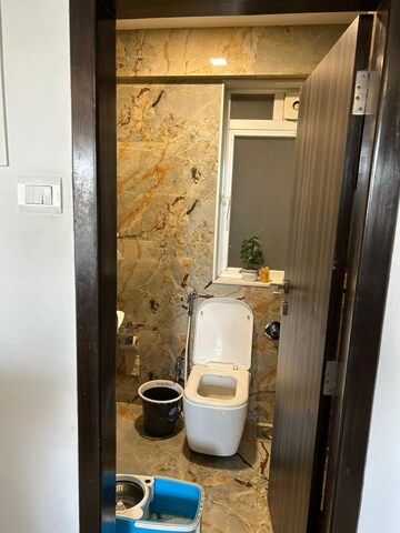 Bathroom in 2 BHK Apartment at New Ambivali, Andheri West – for Sale