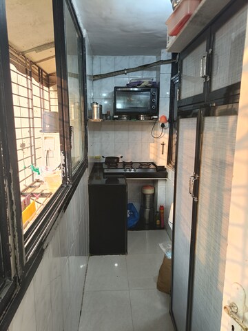 Kitchen in 1 BHK Apartment at Shiv Sagar Nilkanth CHS, Dadar West – for Sale