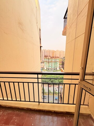 Balcony in 2.5 BHK Apartment at Aims Golf City, Sector 75 – for Rent
