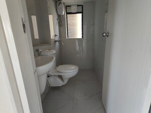 Bathroom in 2 BHK Apartment at Runwal Gardens Phase I, Dombivli East – for Sale