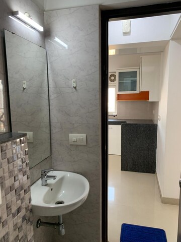 Bathroom in 3 BHK Apartment at Lodha Amara, Kolshet Road – for Rent