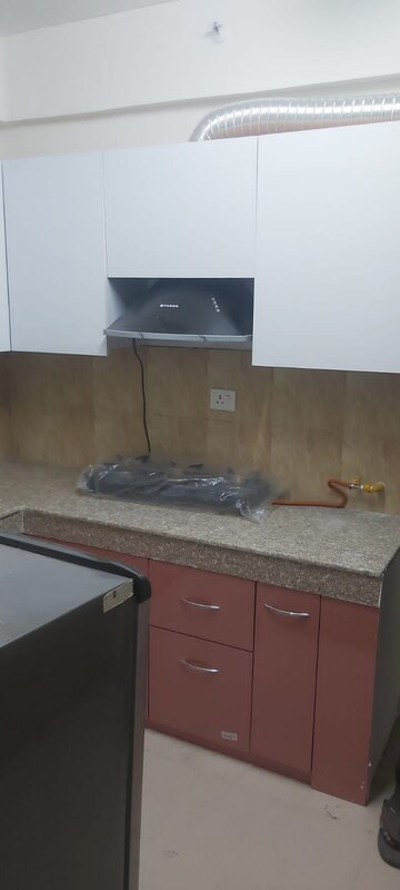 Kitchen in 3 BHK Apartment at Jaypee Greens Kosmos, Sector 134 – for Rent