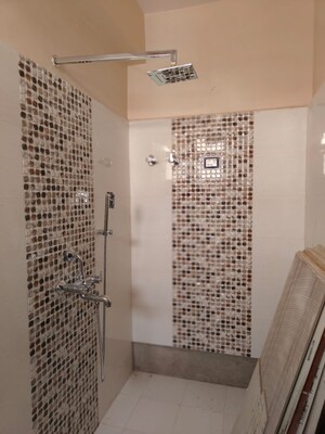 Bathroom in 5 BHK Apartment at Raunak Residency, Rupaspur – for Sale