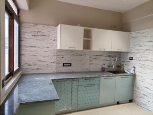 Kitchen in 5 BHK Apartment at Raunak Residency, Rupaspur – for Sale