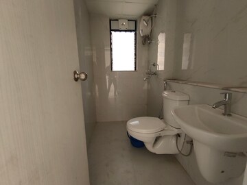 Bathroom in 3 BHK Apartment at Runwal Gardens Phase I, Dombivli East – for Rent