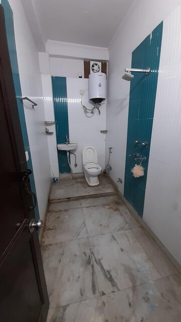 Bathroom in 3 BHK Builder Floor at Ansal Sushant Lok I, Sector 43 – for Rent