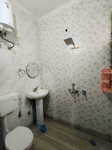 Bathroom in 2 BHK Apartment at Sunny Enclave – for Rent