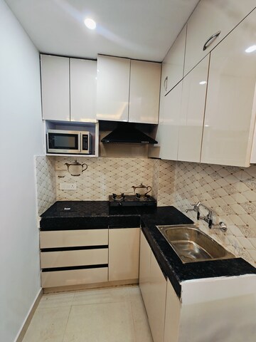 Kitchen in 2 BHK Builder Floor at Ansal Sushant Lok I, Sector 43 – for Rent