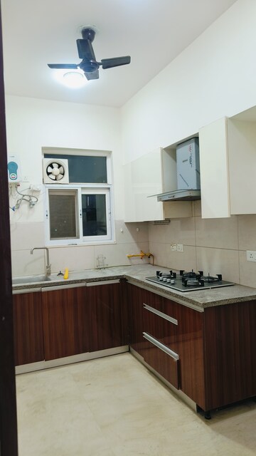 Kitchen in 3 BHK Apartment at Puri Aanandvilas, Sector 81 – for Rent