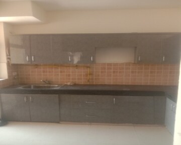 Kitchen in 2 BHK Apartment at Mahagun Mywoods, Sector 16c Greater Noida – for Rent
