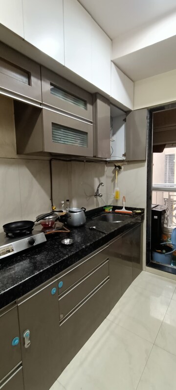 Kitchen in 2 BHK Apartment at JP North Celeste, Mira Road – for Rent