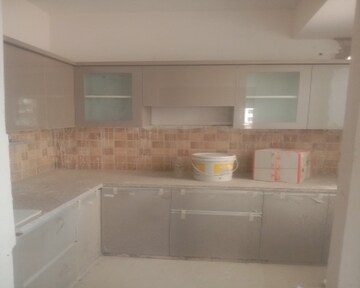 Kitchen in 3 BHK Apartment at Mahagun Mywoods, Sector 16c Greater Noida – for Rent