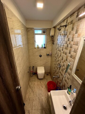 Bathroom in 2.5 BHK Apartment at DLH Orchid, Andheri West – for Rent