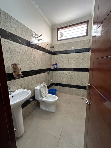 Bathroom in 2 BHK Builder Floor at Dhakoli – for Rent