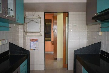 Kitchen in 2 BHK Apartment at Raheja Gardens Fantasia, Raghunath Nagar – for Rent
